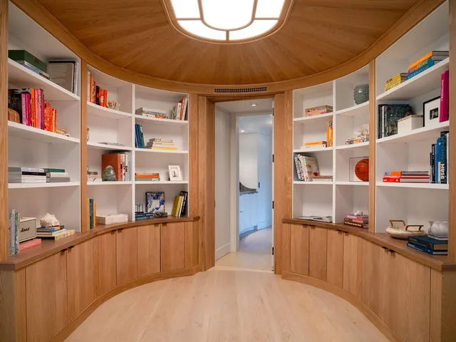 a bedroom with a bed and closet