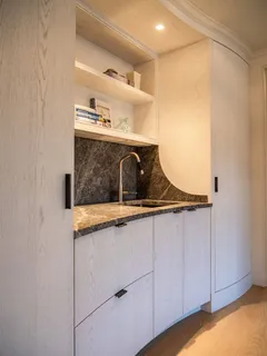 a bathroom with a sink and mirror