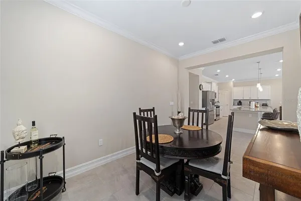 a view of a dining room with furniture