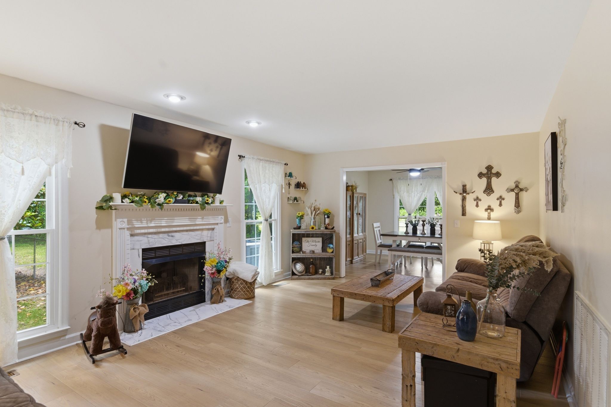 99 Smoke Rise Circle Manchester, TN 37355 - Photo 6 of 45 a living room with furniture a flat screen tv and a fireplace