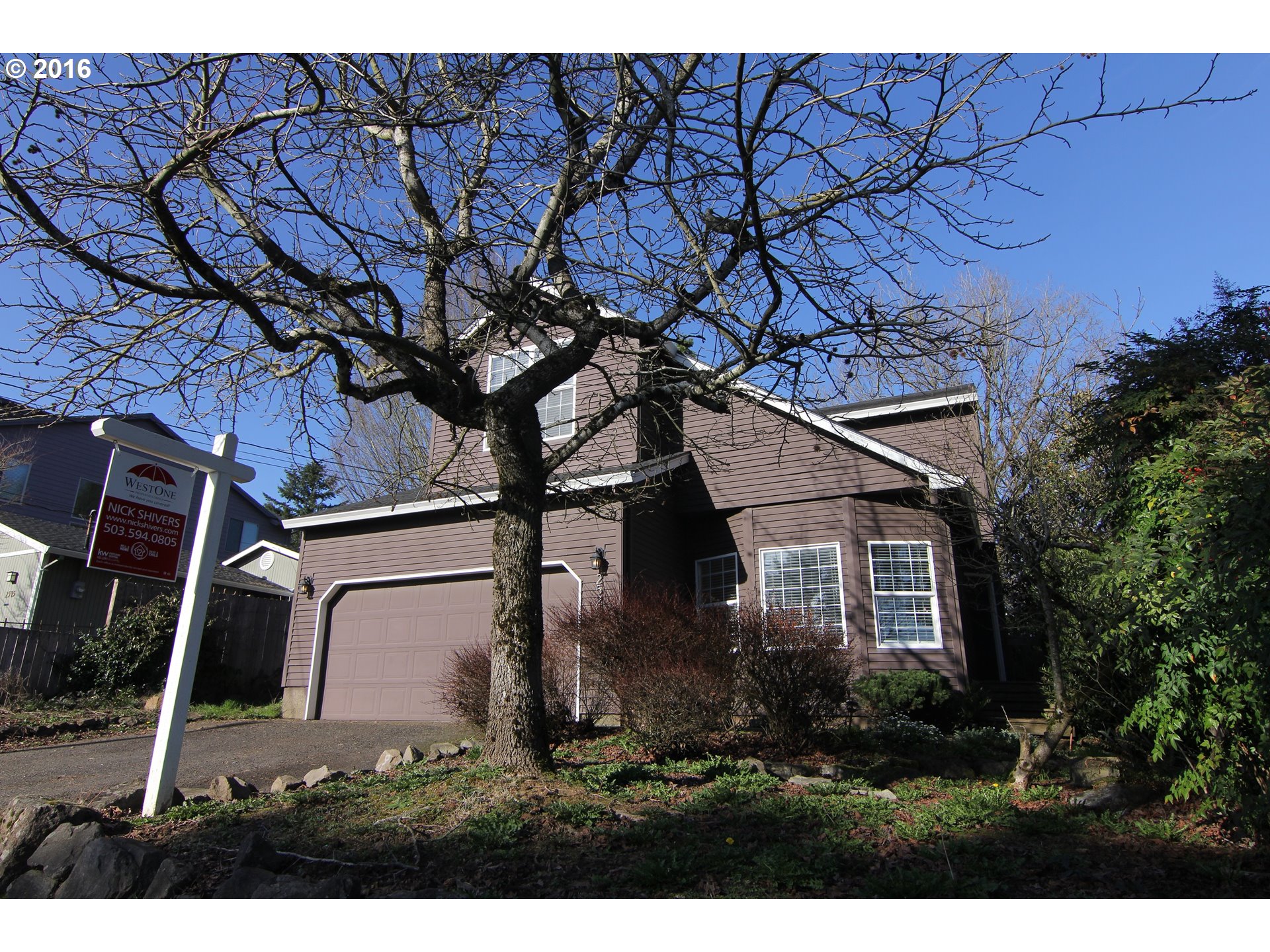 2525 Sunset Avenue West Linn, OR 97068 - Photo 1 of 25 front view of a house with a tree