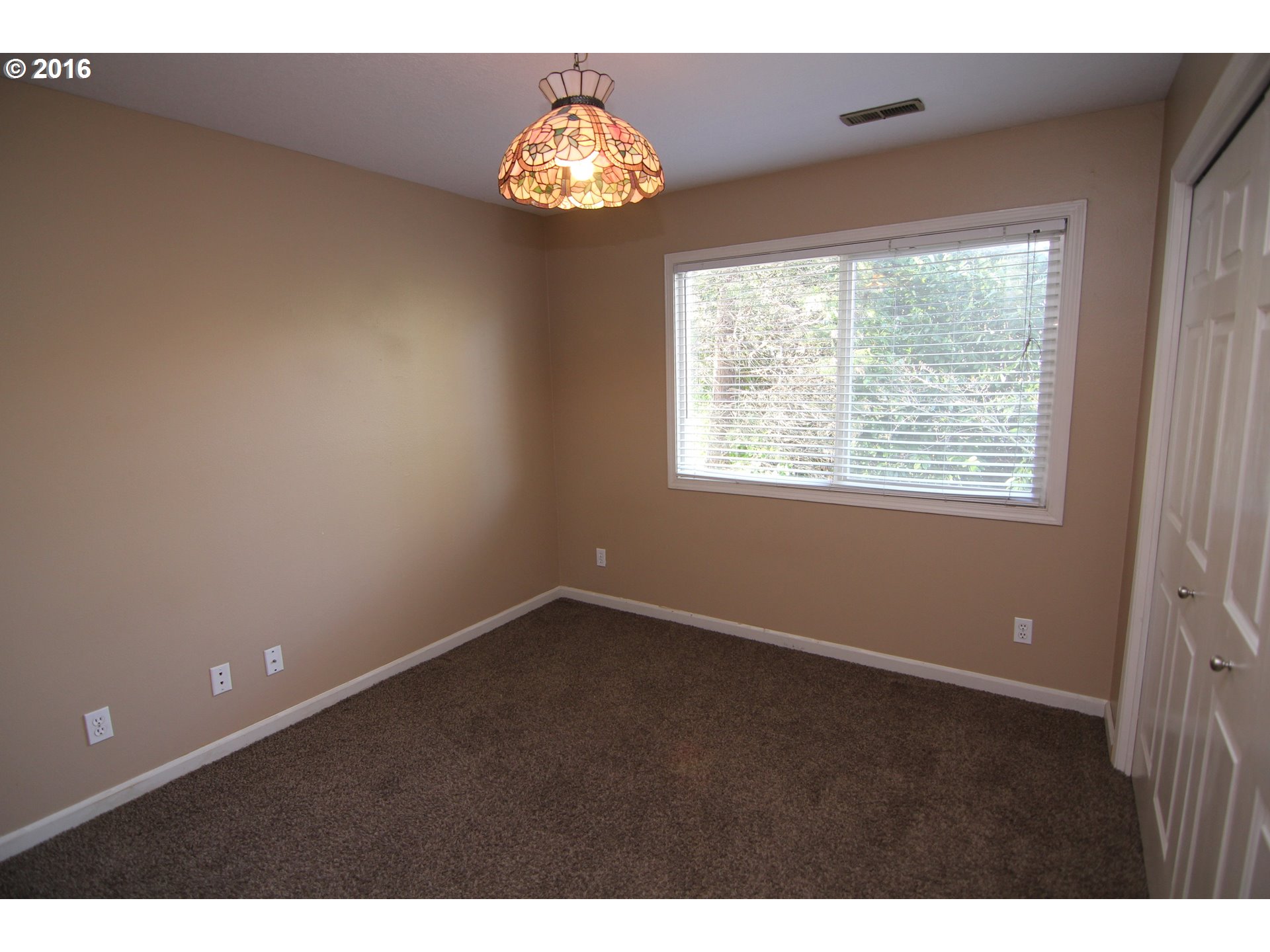 2525 Sunset Avenue West Linn, OR 97068 - Photo 17 of 25 a view of an empty room with a window