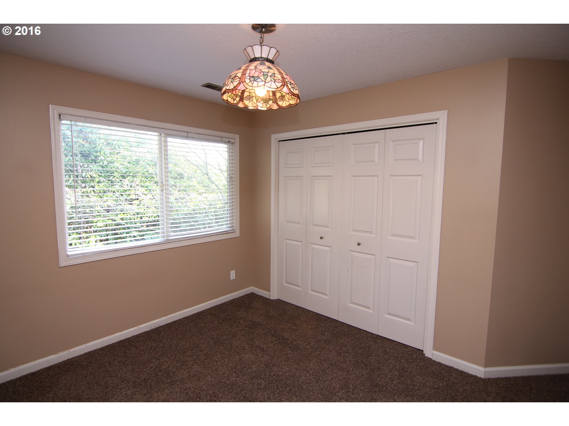 2525 Sunset Avenue West Linn, OR 97068 - Photo 18 of 25 a view of an empty room with a window