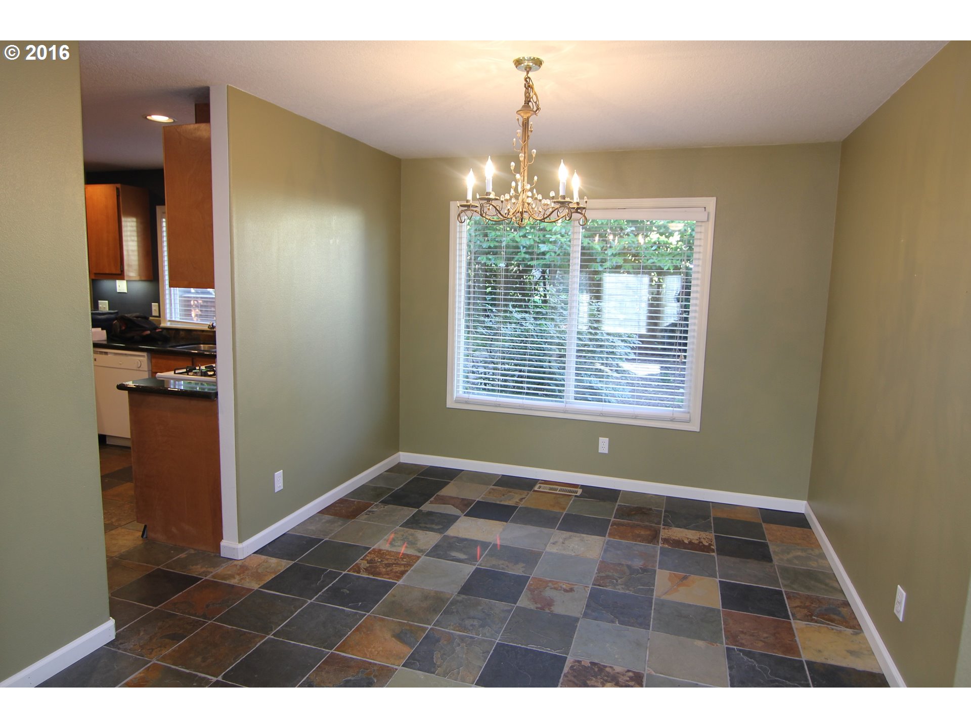 2525 Sunset Avenue West Linn, OR 97068 - Photo 5 of 25 a view of an empty room with window and wooden floor