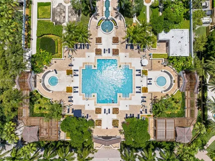 a table and chairs sitting in front of a city