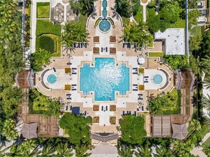 a table and chairs sitting in front of a city