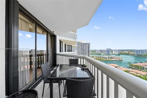 a view of a balcony with city view