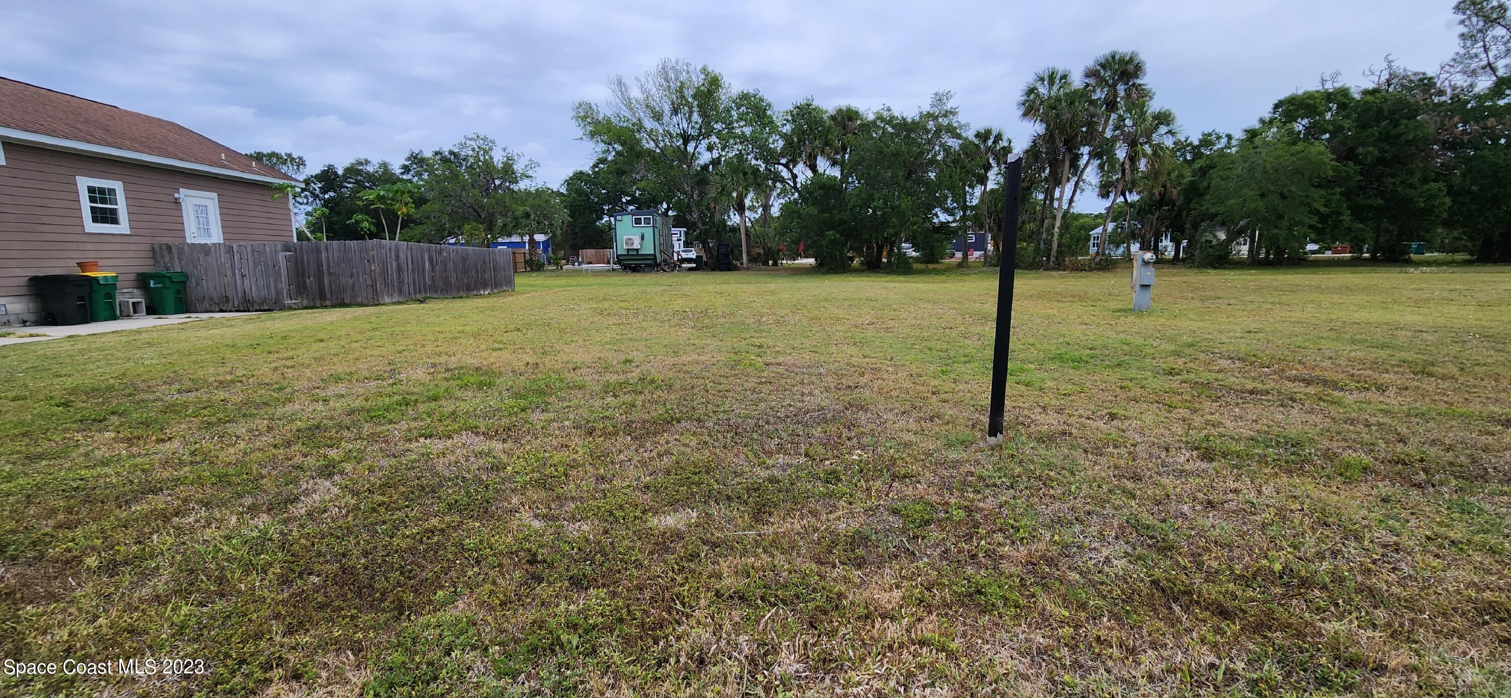 207 Teal Drive Cocoa, FL 32926 - Photo 3 of 3 a view of a tree in a yard