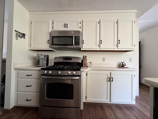 43 West Meadow Road, Unit 43 Haverhill, MA 01832 - Photo 19 of 42 a kitchen with stainless steel appliances granite countertop a stove a sink and a microwave