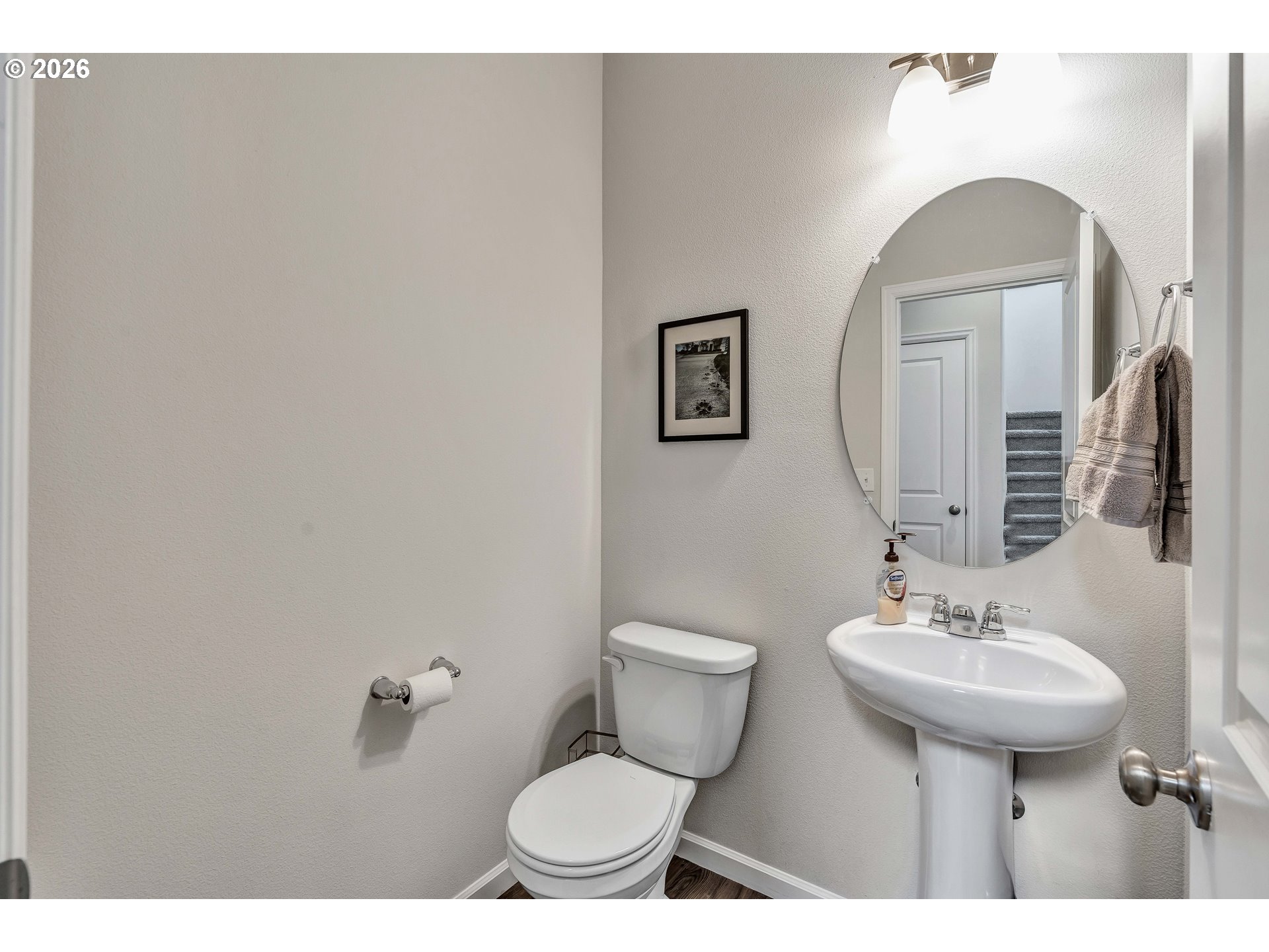 2137 Southeast 15th Alley Gresham, OR 97080 - Photo 15 of 44 a bathroom with a toilet sink and mirror