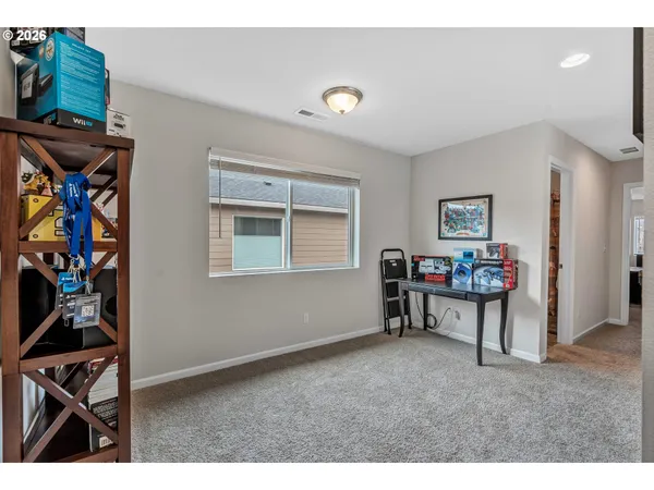 a view of a workspace with furniture