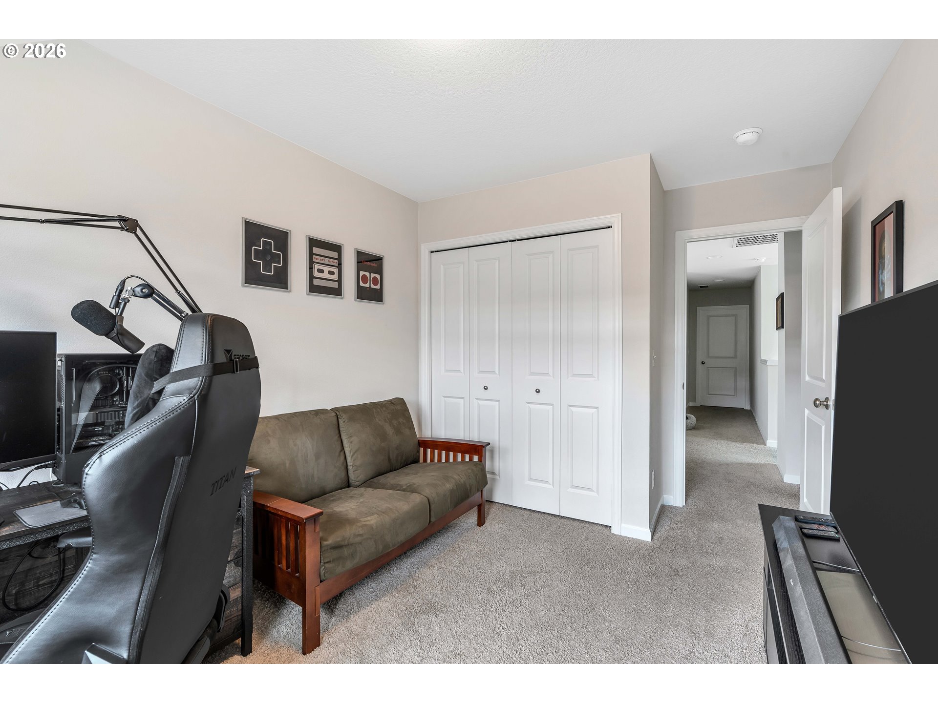 2137 Southeast 15th Alley Gresham, OR 97080 - Photo 23 of 44 a living room with furniture and a flat screen tv