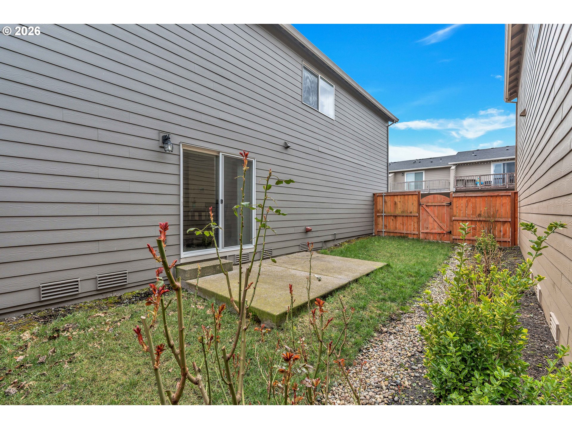 2137 Southeast 15th Alley Gresham, OR 97080 - Photo 34 of 44 a view of a backyard with plants and a patio
