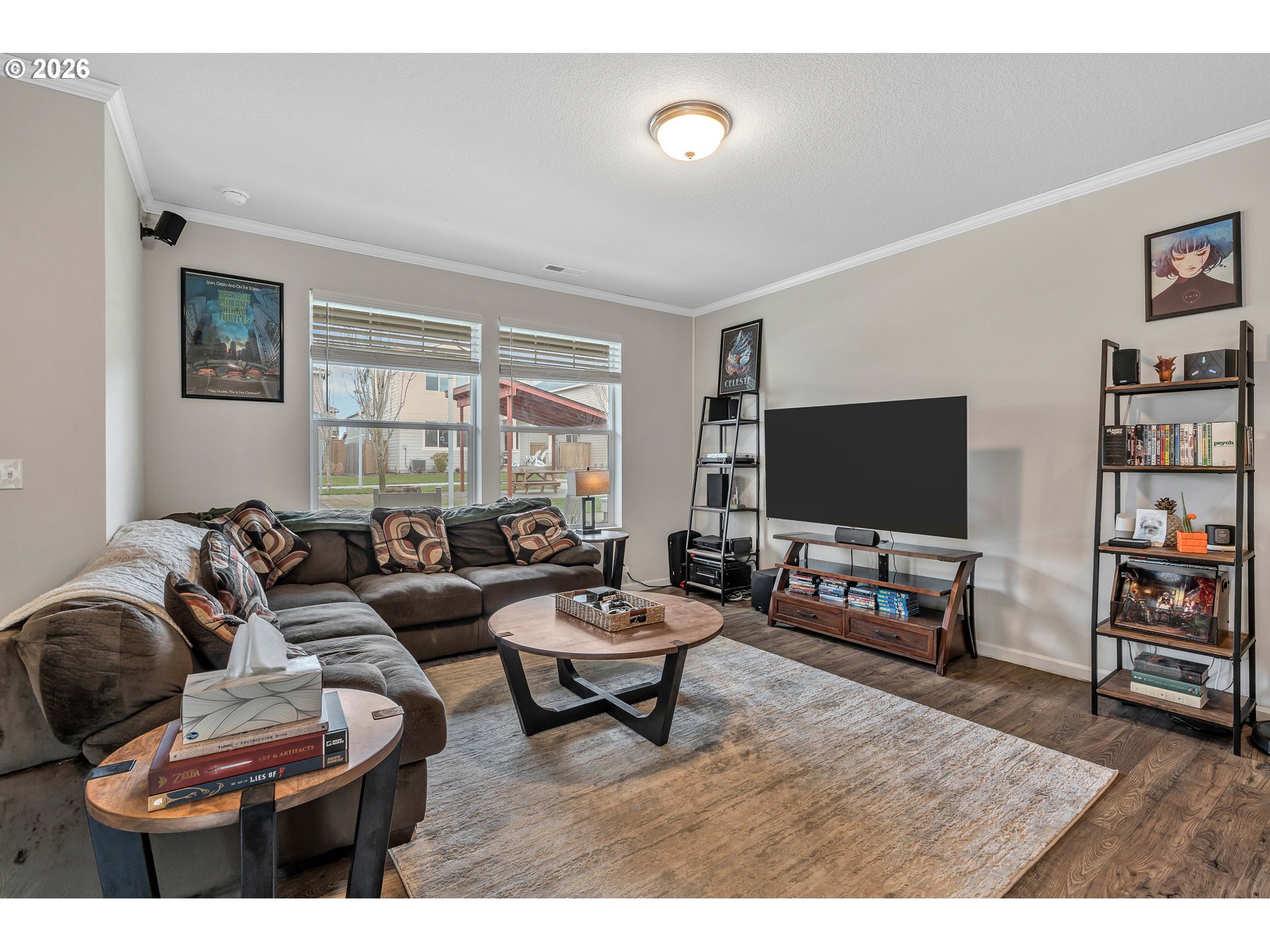 2137 Southeast 15th Alley Gresham, OR 97080 - Photo 7 of 44 a living room with furniture and a flat screen tv