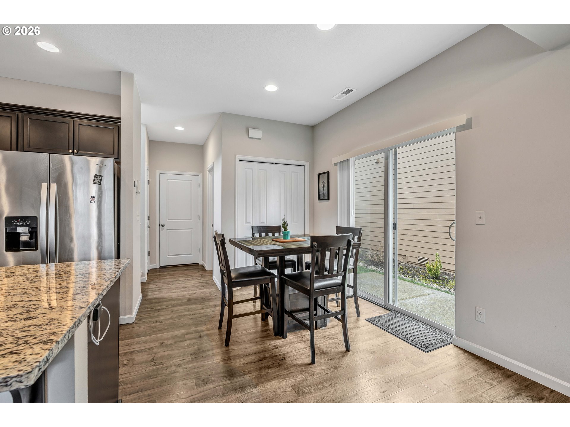 2137 Southeast 15th Alley Gresham, OR 97080 - Photo 10 of 44 a view of a dining room with furniture and a chandelier
