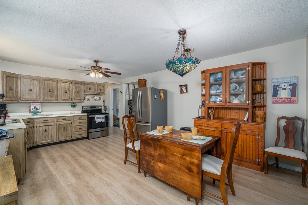 1813 John Smith Road East Blairsville, GA 30512 - Photo 13 of 41 a dining room with furniture and window