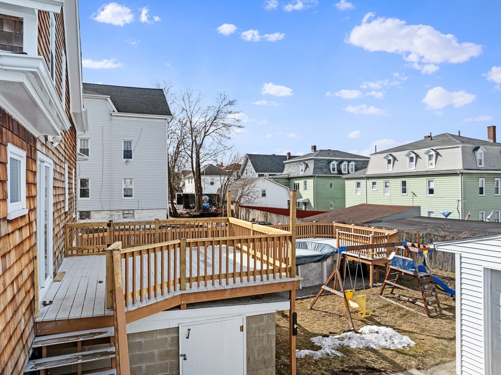 173 Whipple Street Fall River, MA 02721 - Photo 35 of 41 a view of a balcony with a dinning table and chairs