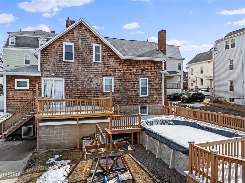 173 Whipple Street Fall River, MA 02721 - Photo 9 of 41 a front view of a house with a balcony
