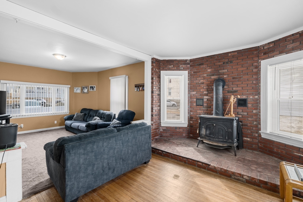 173 Whipple Street Fall River, MA 02721 - Photo 10 of 41 a living room with furniture and a window