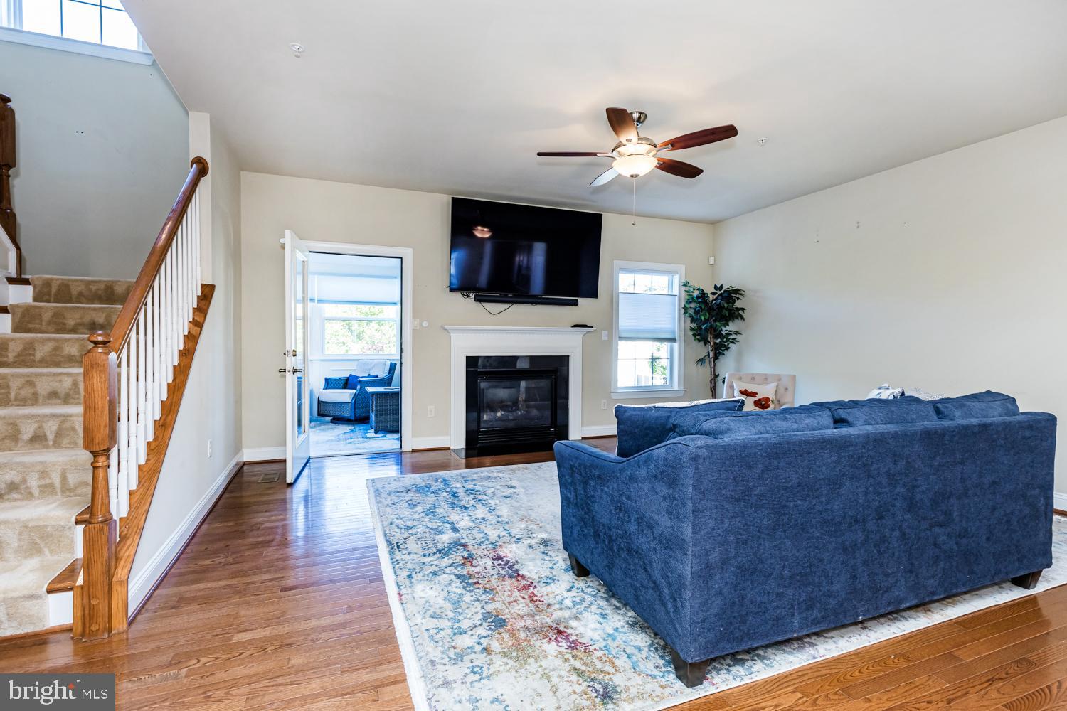 2605 Rockhampton Road Ellicott City, MD 21042 - Photo 16 of 75 Family room with hardwoods and TV