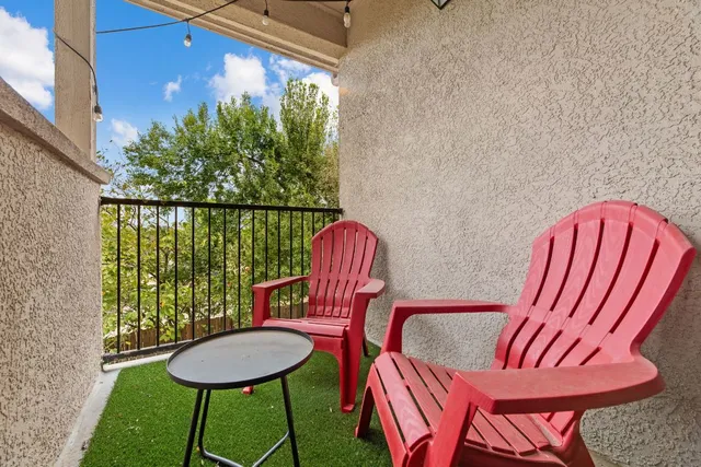 a view of a chairs in a balcony