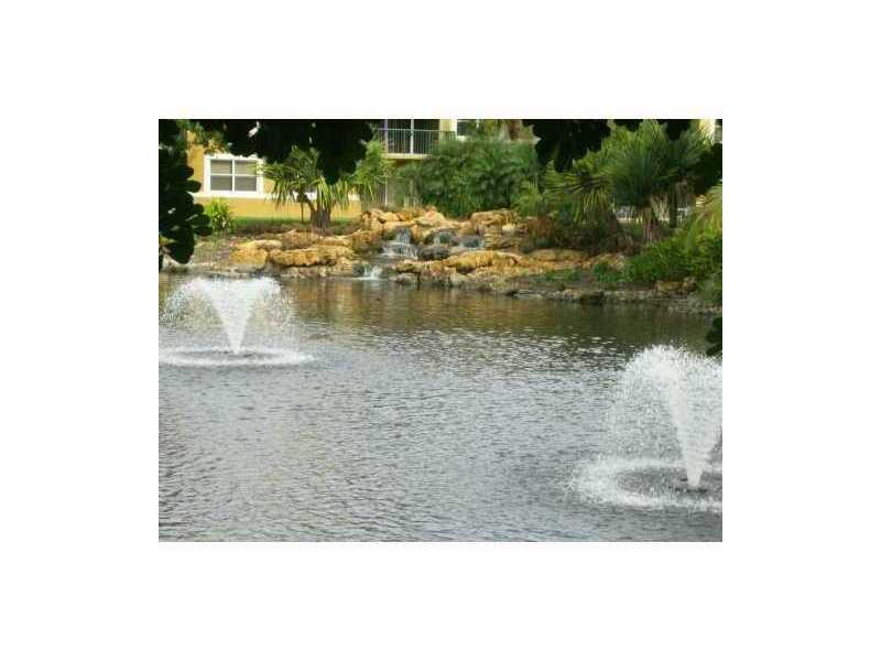 8977 Wiles Road, Unit 1052 Coral Springs, FL 33067 - Photo 3 of 8 a view of a lake view