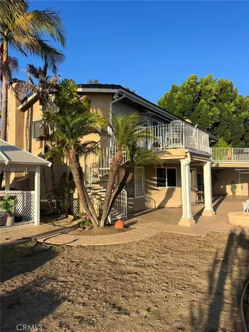 a view of a house with a park