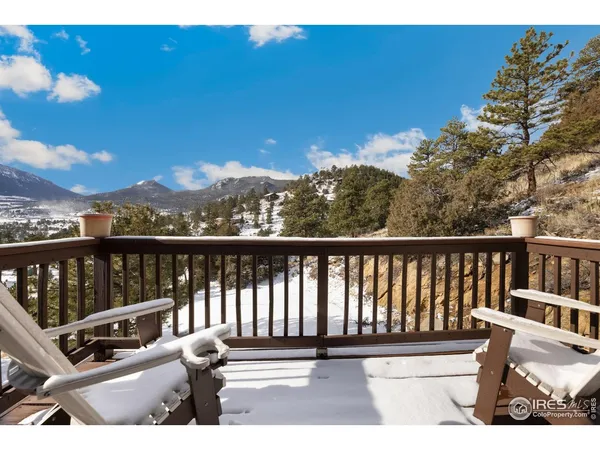 a view of balcony with furniture