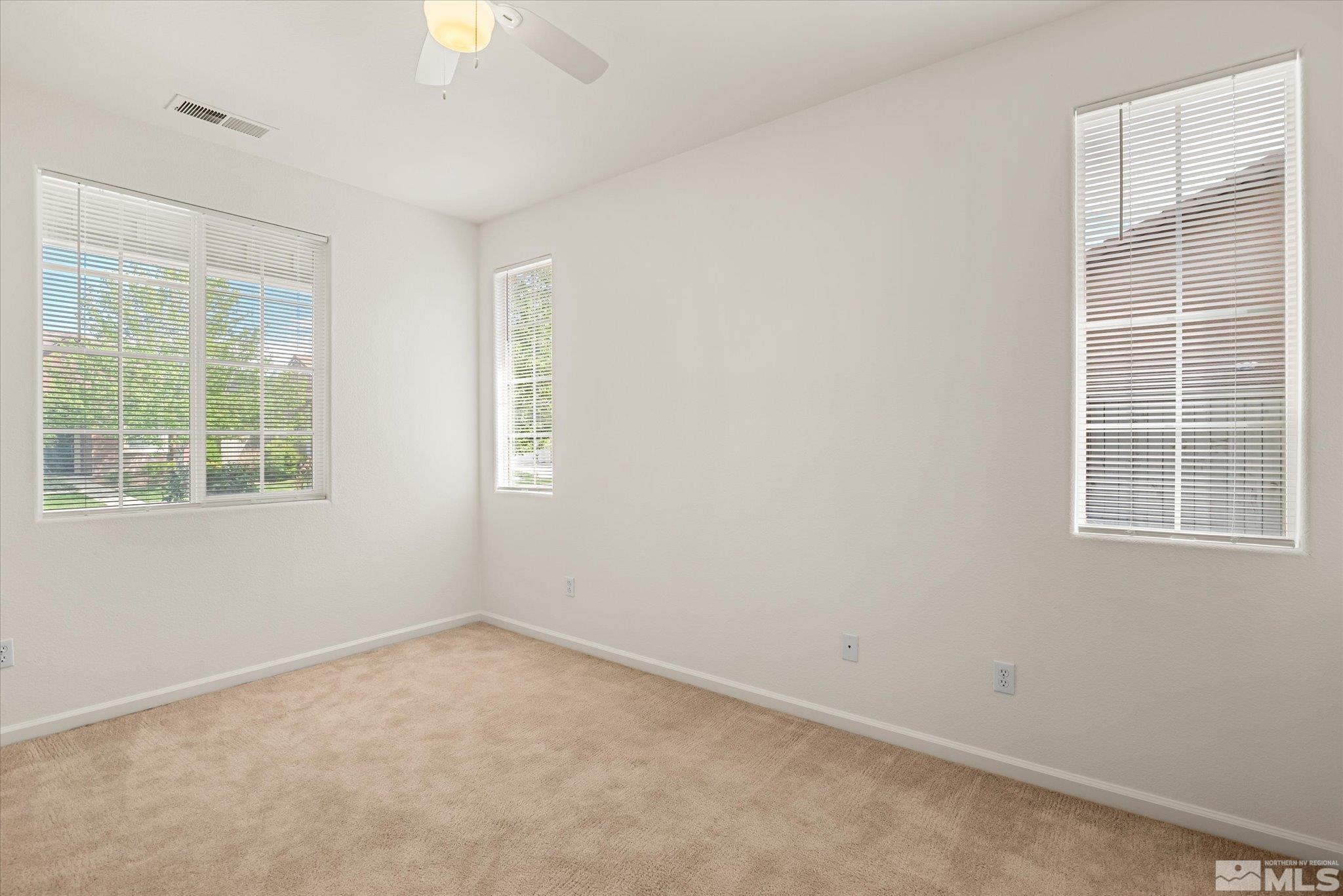 10555 Thistle Berry Court Reno, NV 89521 - Photo 30 of 35 an empty room with a window