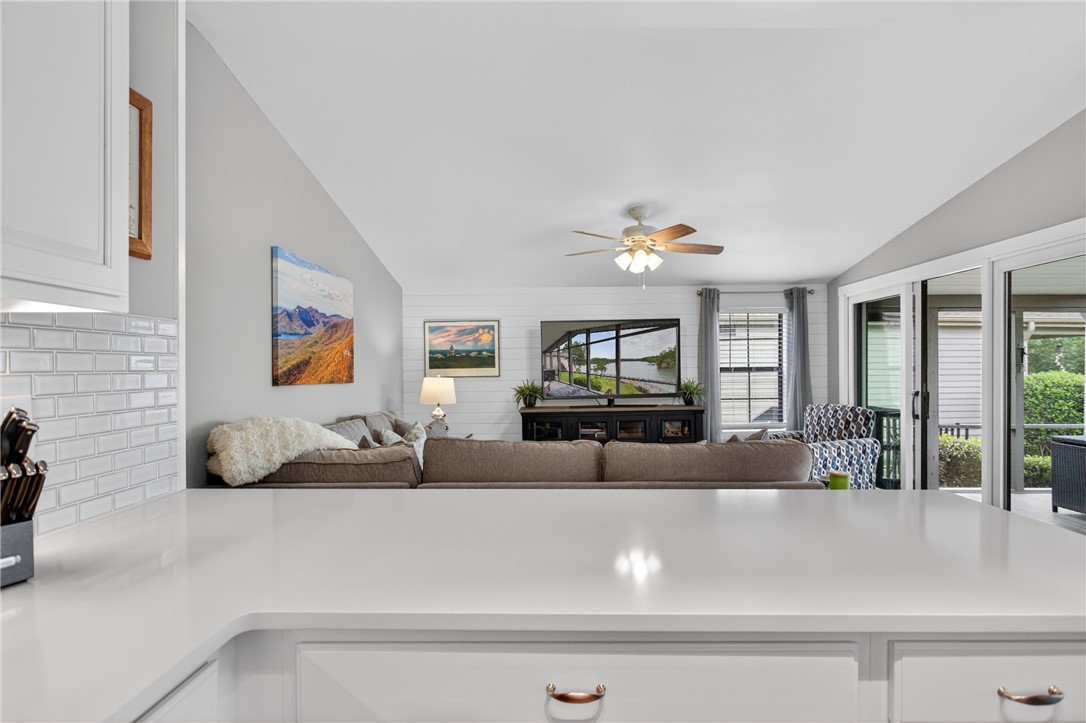 1230 Melton Road, Unit 4 West Union, SC 29696 - Photo 33 of 48 This living area provides ample space for comfortable gatherings, flowing seamlessly to an outdoor living area.