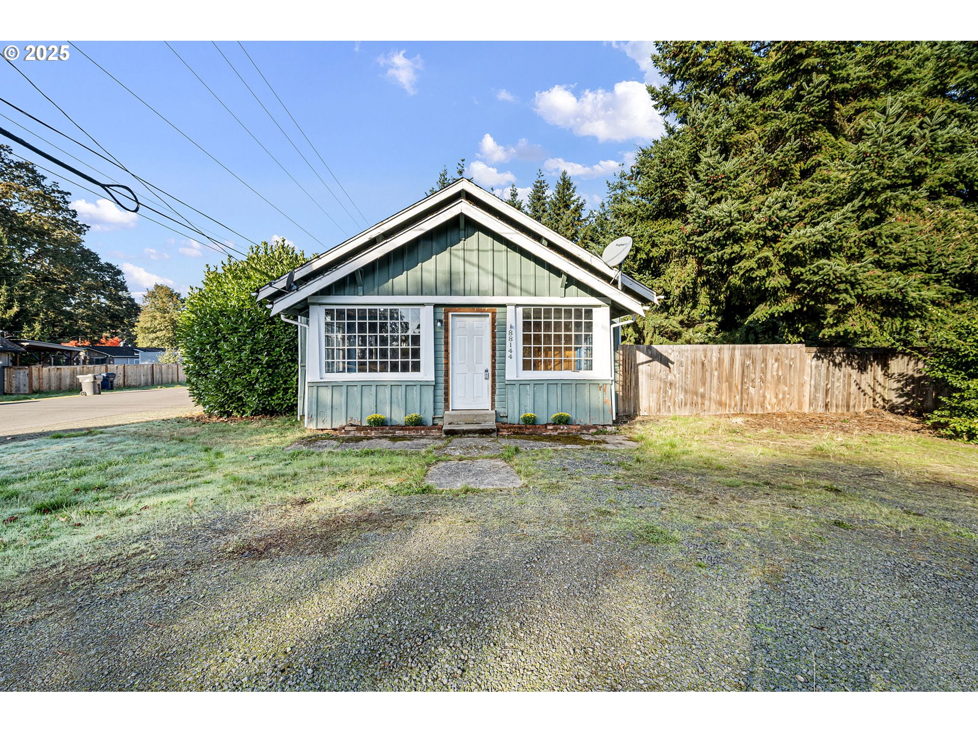88144 4th Street Veneta, OR 97487 - Photo 2 of 21 a view of a house with a yard and garage