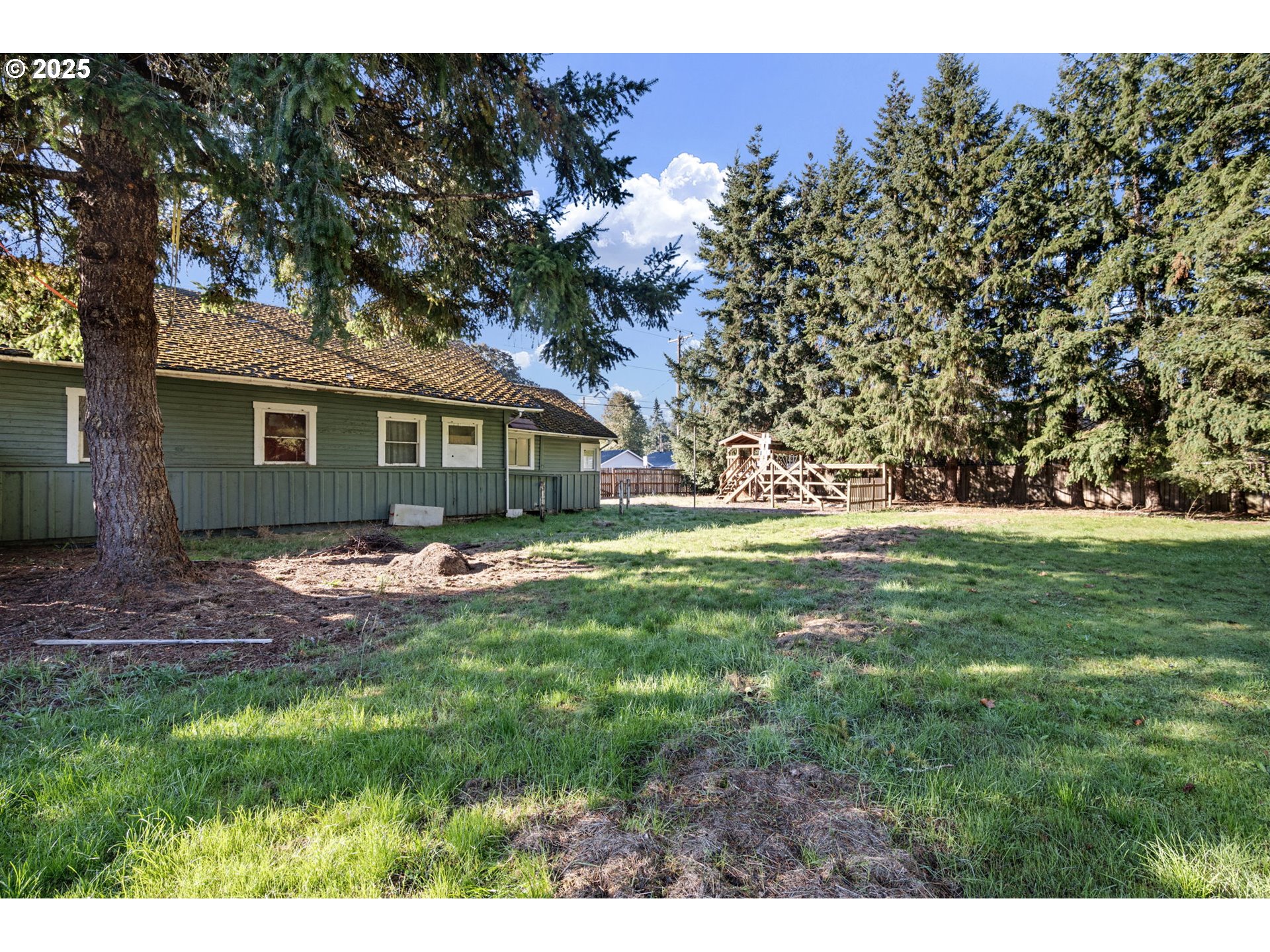 88144 4th Street Veneta, OR 97487 - Photo 21 of 21 a view of house with backyard