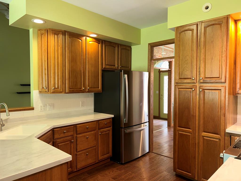 114 Oak Ridge Drive Clarion, PA 16214 - Photo 8 of 38 a kitchen with stainless steel appliances granite countertop a refrigerator and a sink