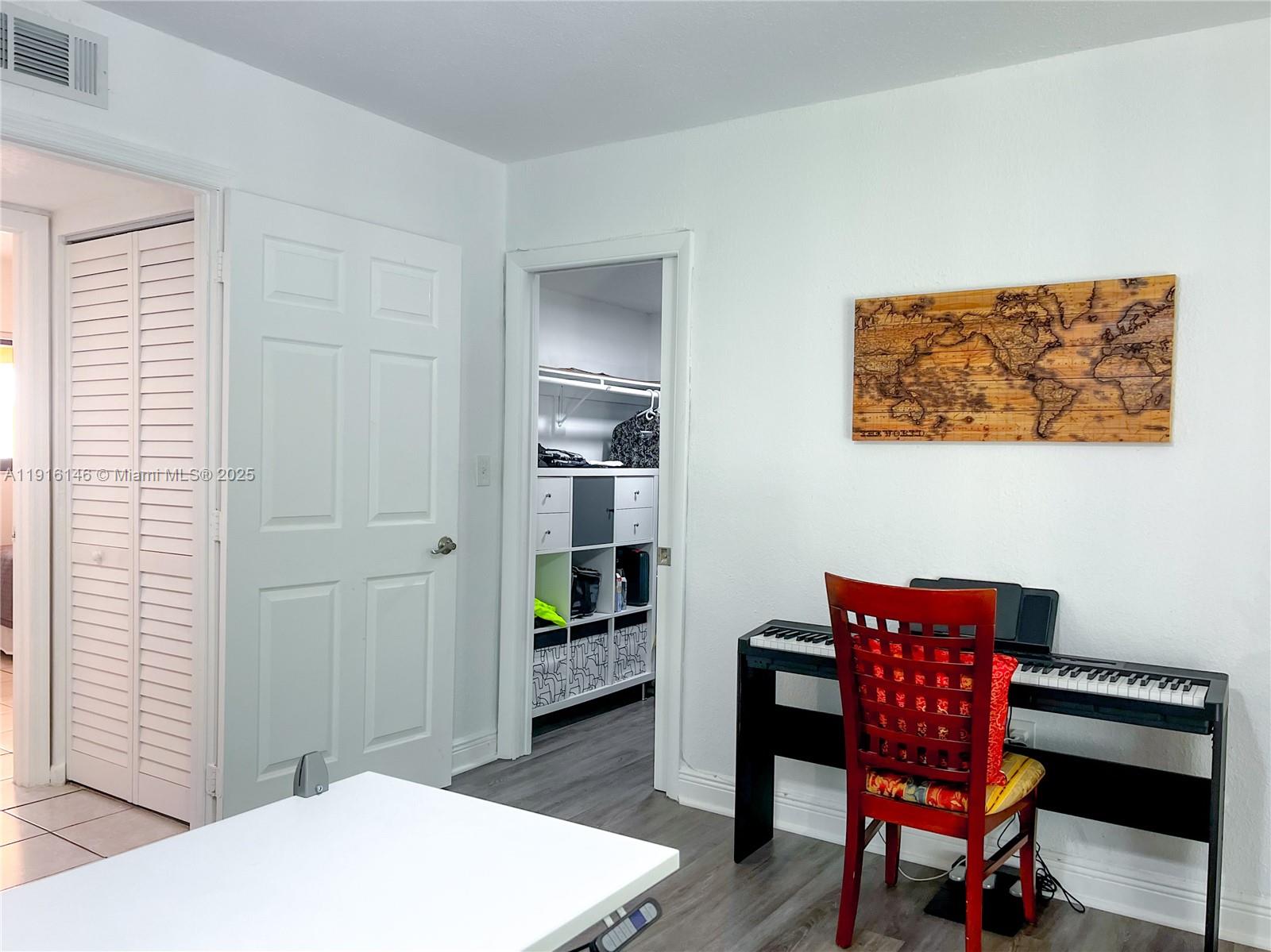 8600 Southwest 133rd Avenue Road, Unit 401 Miami, FL 33183 - Photo 13 of 31 a living room with furniture and a table