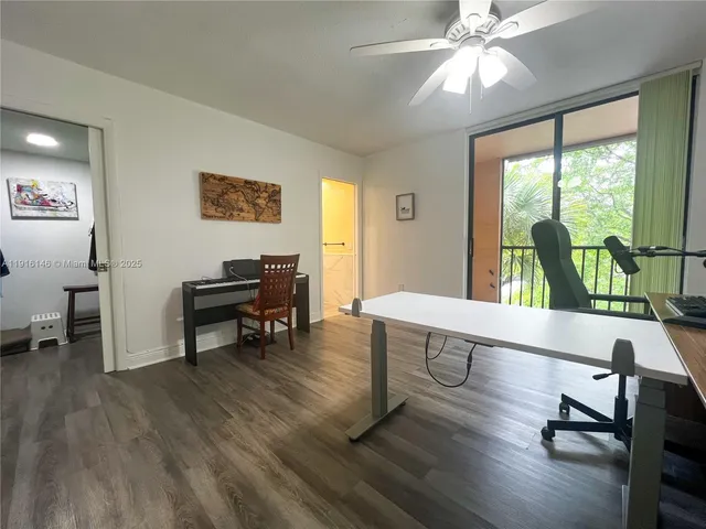 a bathroom with a toilet sink and shower
