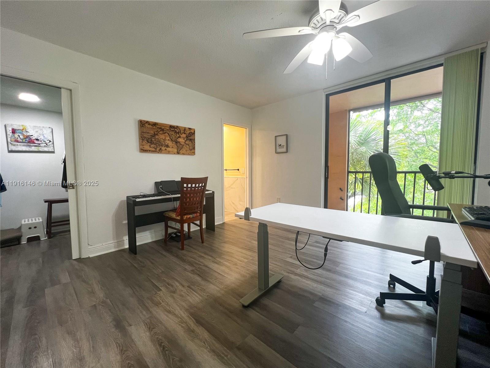 8600 Southwest 133rd Avenue Road, Unit 401 Miami, FL 33183 - Photo 14 of 31 a view of a livingroom with furniture and a window