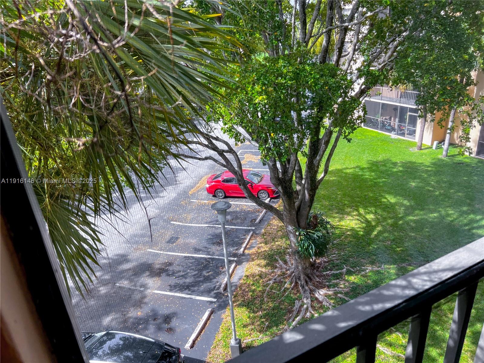 8600 Southwest 133rd Avenue Road, Unit 401 Miami, FL 33183 - Photo 17 of 31 a view of outdoor space and yard