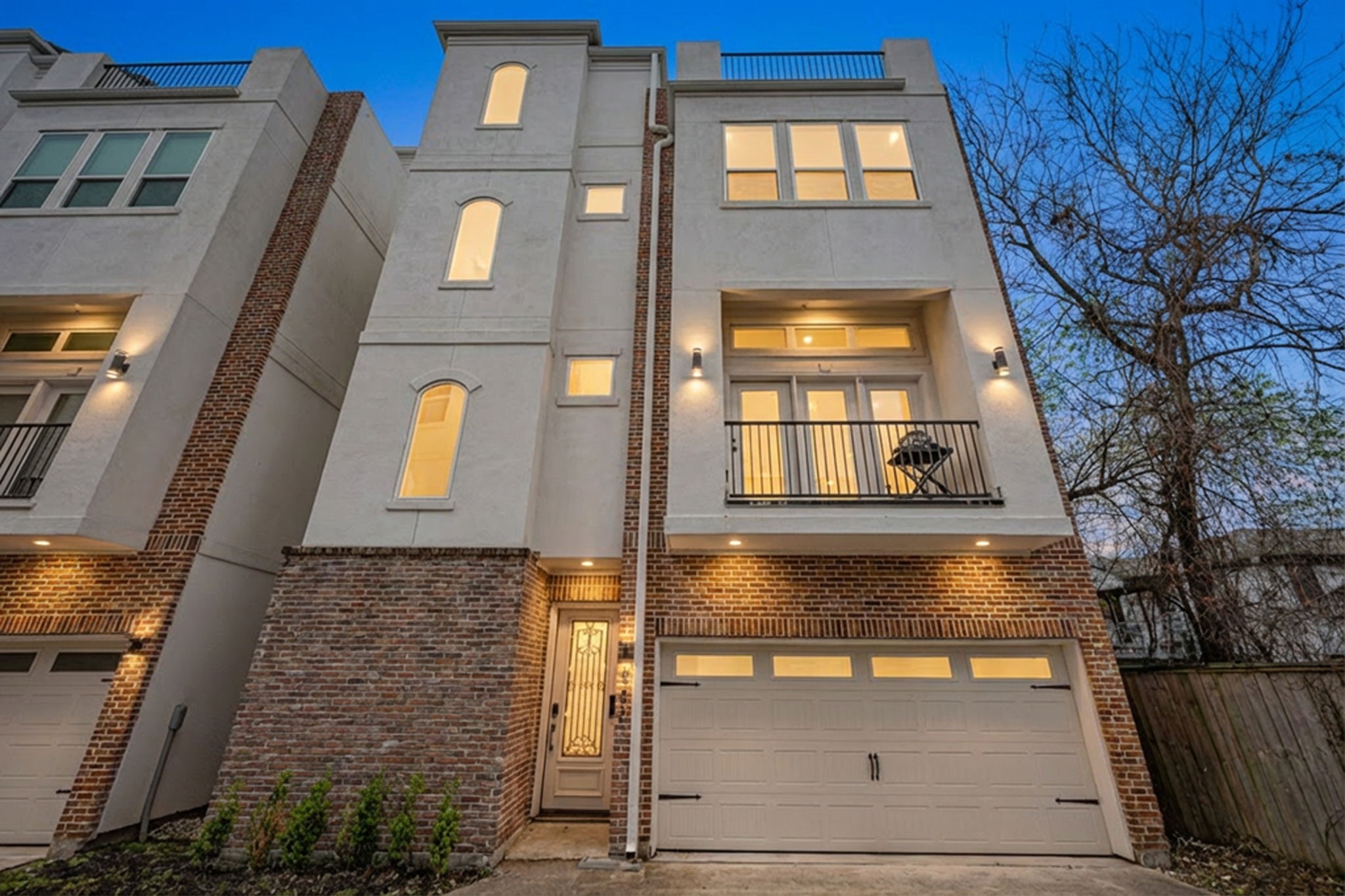 a view of a brick house with windows
