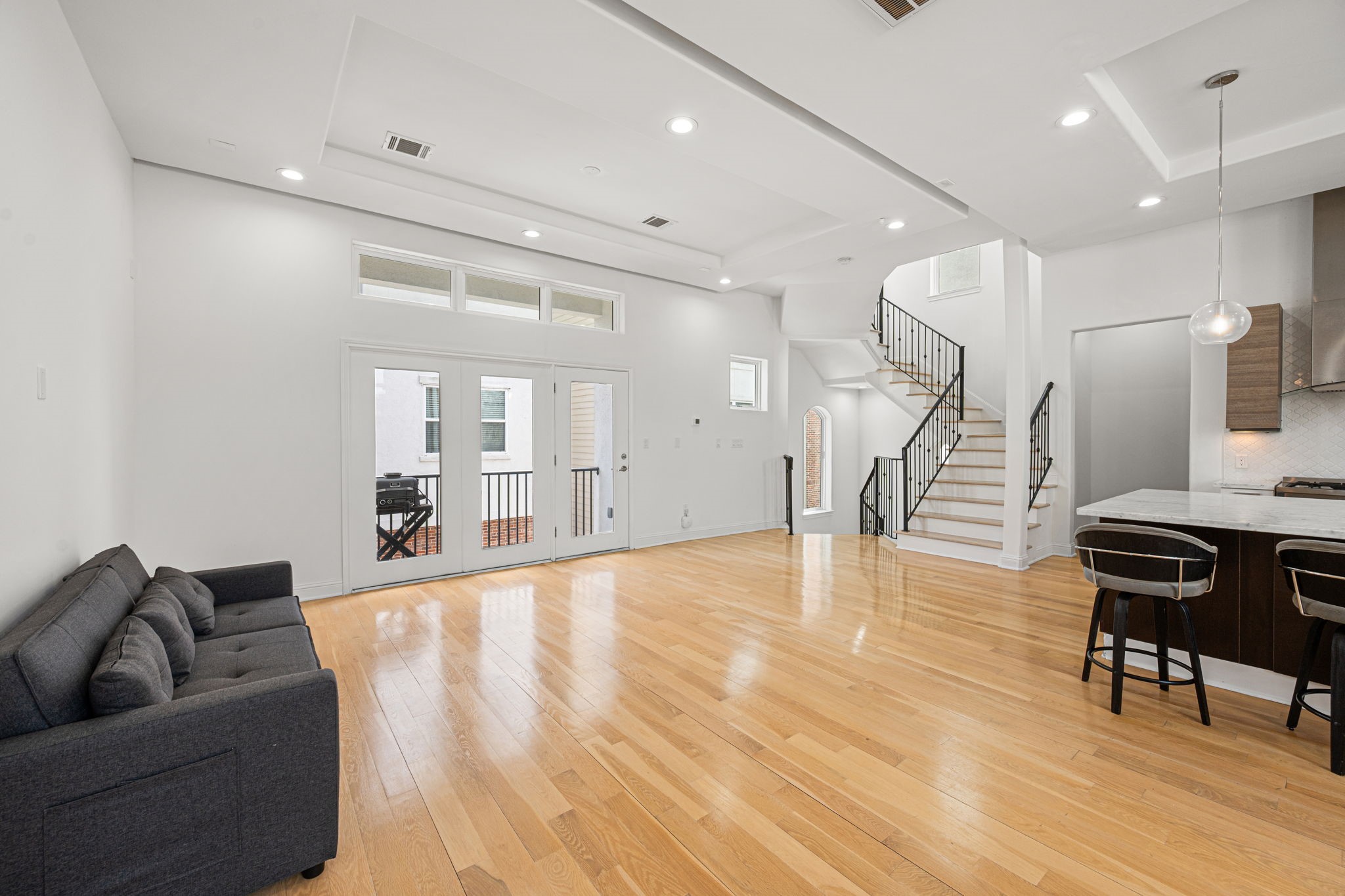 1842 Colquitt Street Houston, TX 77098 - Photo 10 of 42 a living room with furniture and a wooden floor