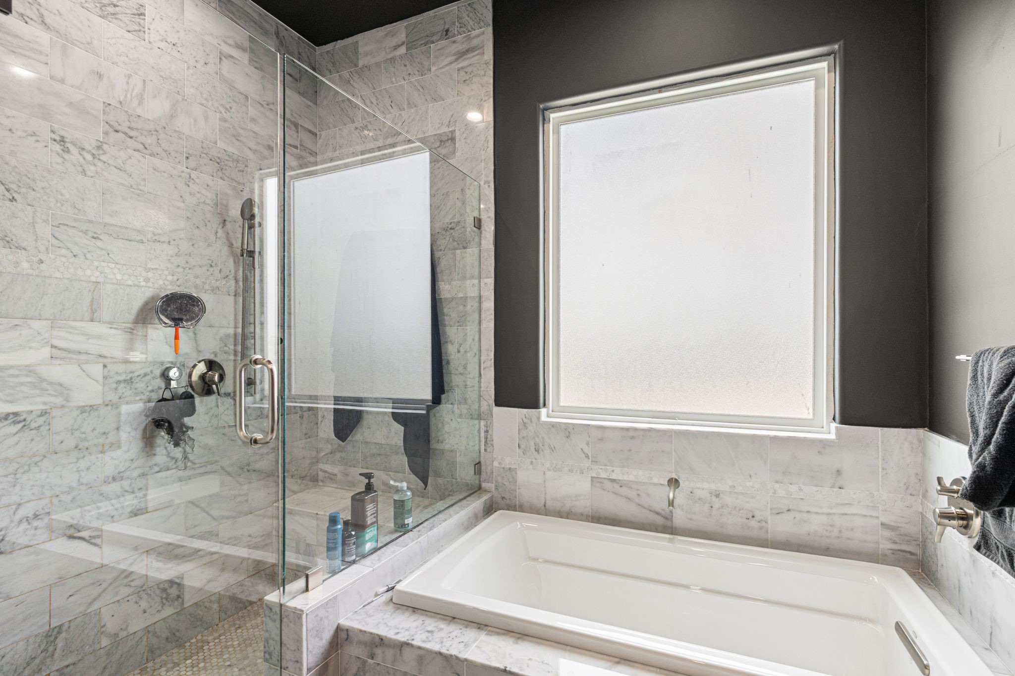 1842 Colquitt Street Houston, TX 77098 - Photo 22 of 42 a bathroom with a tub and a sink