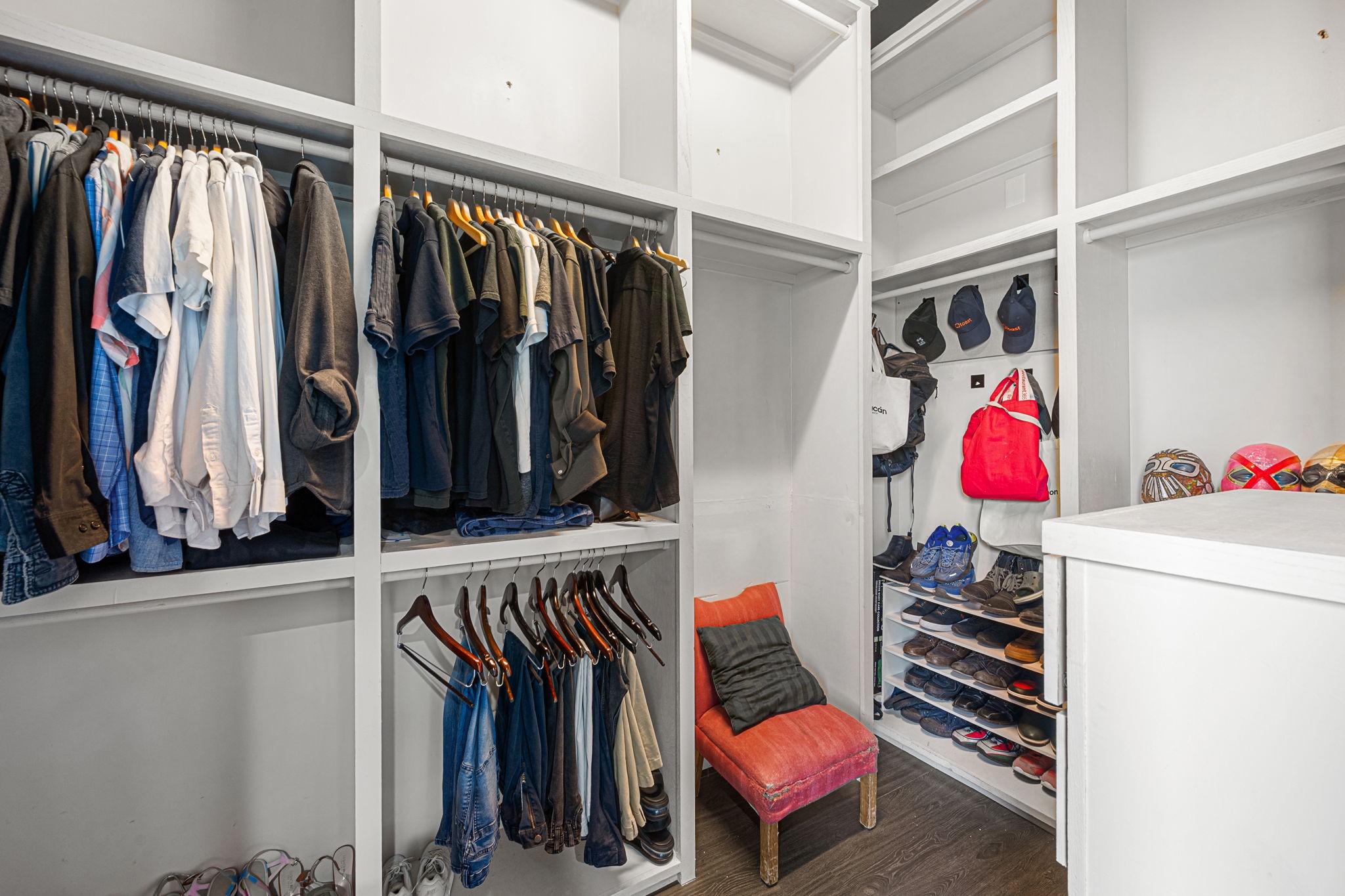 1842 Colquitt Street Houston, TX 77098 - Photo 24 of 42 a view of walk in closet with clothes and shoes