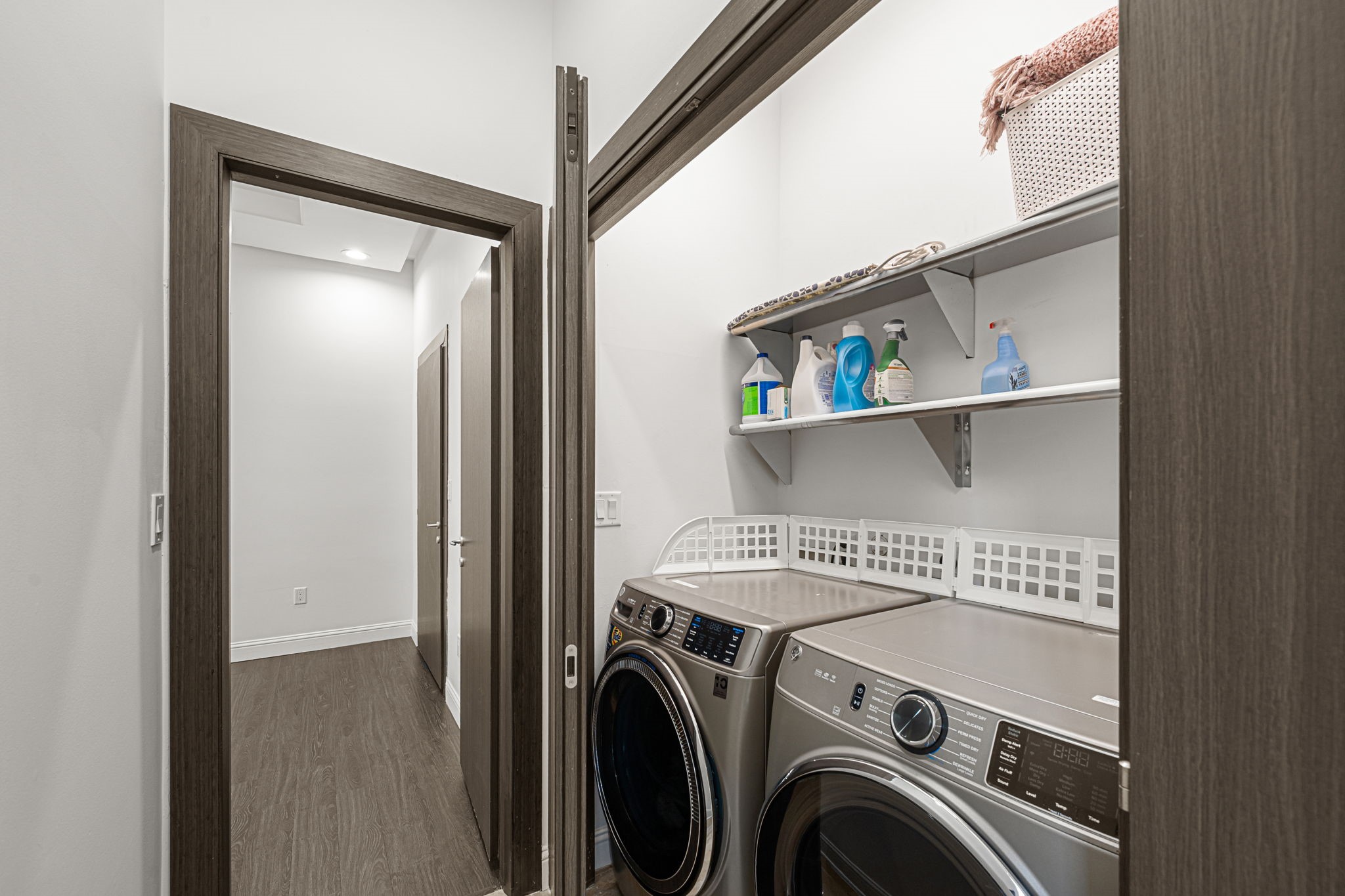 1842 Colquitt Street Houston, TX 77098 - Photo 27 of 42 a view of washer and dryer in a room