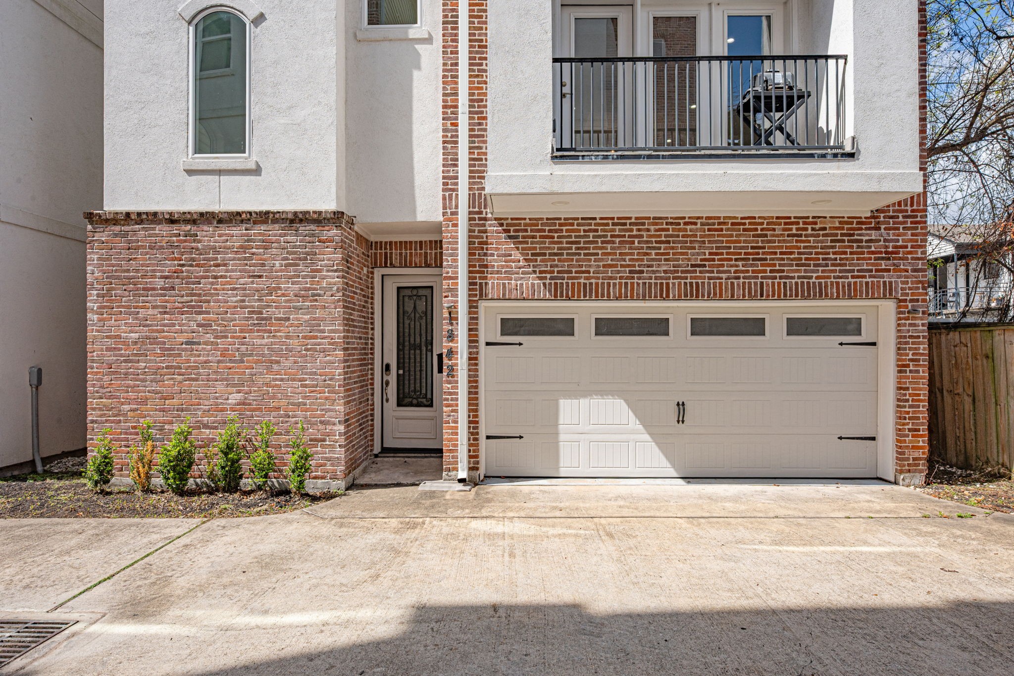 1842 Colquitt Street Houston, TX 77098 - Photo 5 of 42 a front view of a house with a parking space