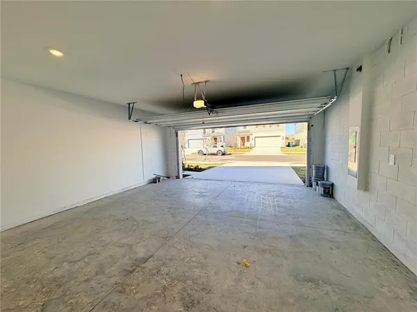 a kitchen with granite countertop a sink and a stove top oven