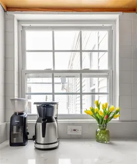 a view of kitchen with a window