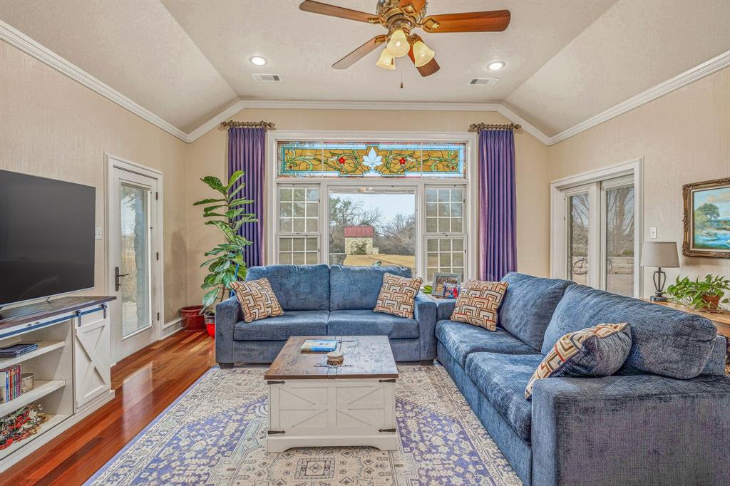 501 County Road 103 Comanche, TX 76442 - Photo 13 of 40 a living room with furniture and a flat screen tv