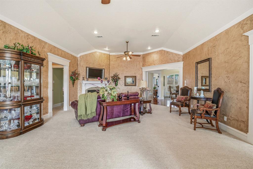 501 County Road 103 Comanche, TX 76442 - Photo 20 of 40 a living room with furniture and a flat screen tv
