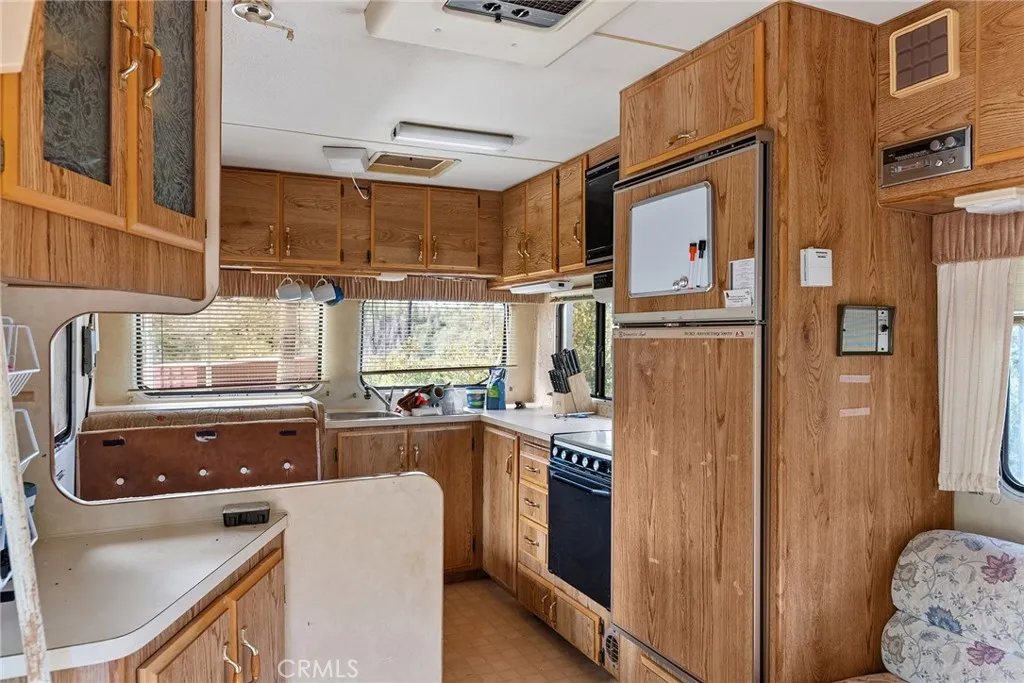 0 Deadwood Road Oroville, CA 95965 - Photo 28 of 55 a kitchen with refrigerator and window