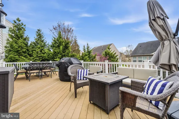 a view of a chairs and table in patio
