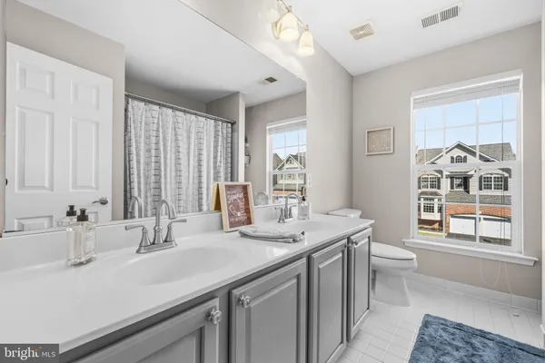a kitchen with a sink and a window